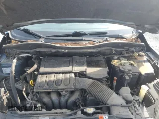 2014 Mazda 2 Sport z VIN JM1DE1KY0E0177473, wystawiony jako Copart lot #60984055 z przebiegiem 88 202 mil mil oraz Szkoda całkowita • Salvage title. Historia ofert i sprzedaży dostępna na DreamBid. Obrazek 11.