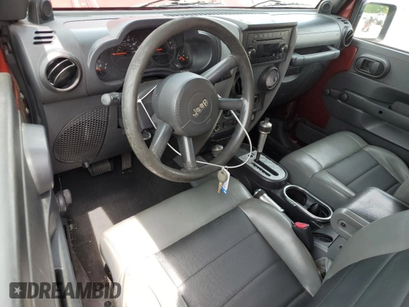 2009 Jeep Wrangler X с VIN 1J4FA24129L749314, выставлен на аукционе Copart как лот 58160995 с пробегом 93 603 миль миль и Списание • Salvage title. История ставок и продаж доступна на DreamBid. Изображение 8.