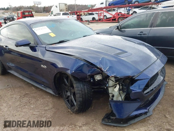 2018 Ford Mustang GT z VIN 1FA6P8CF0J5128561, wystawiony jako IAAI lot #41078319 z przebiegiem 72 615 mil mil oraz . Historia ofert i sprzedaży dostępna na DreamBid. Obrazek 6.