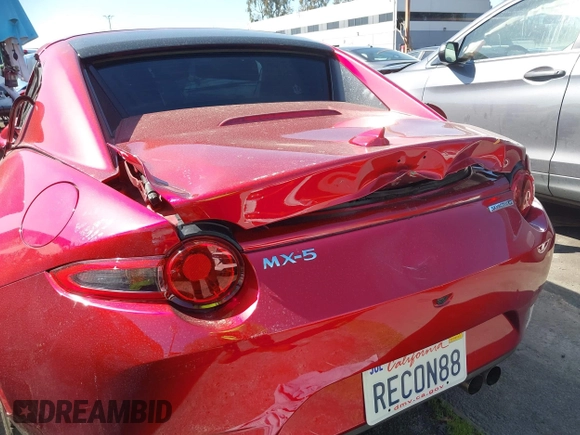 2021 Mazda MX-5 Miata Grand Touring с VIN JM1NDAM71M0459437, выставлен на аукционе IAAI как лот 41808704 с пробегом 19 368 миль миль и . История ставок и продаж доступна на DreamBid. Изображение 21.