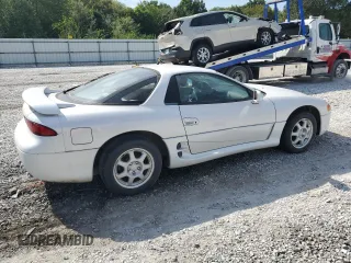1996 Mitsubishi 3000GT GT z VIN JA3AM84J7TY005775, wystawiony jako Copart lot #70461554 z przebiegiem 102 704 mil mil oraz Tytuł czysty. Historia ofert i sprzedaży dostępna na DreamBid. Obrazek 3.