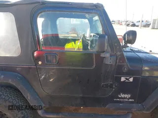 2003 Jeep Wrangler X с VIN 1J4FA39S63P330826, выставлен на аукционе IAAI как лот 41476438 с пробегом 146 517 миль миль и . История ставок и продаж доступна на DreamBid. Изображение 13.