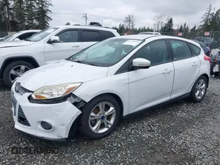 2014 Ford Focus SE z VIN 1FADP3K29EL185755, wystawiony jako IAAI lot #41730618 z przebiegiem 58 707 mil mil oraz . Historia ofert i sprzedaży dostępna na DreamBid. Obrazek 2.