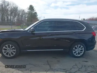 2014 BMW X5 xDrive35i with VIN 5UXKR0C57E0H20944, listed as a IAAI auction lot 42011451 with 208,205 mi miles. Bid and sale history available at carsss.com. Image 14.