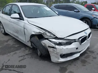 2015 BMW 3 Series 320i with VIN WBA3B1C5XFK137171, listed as a IAAI auction lot 41736278 with 28,673 mi miles. Bid and sale history available at carsss.com. Image 6.
