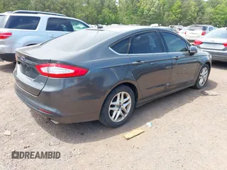 2016 Ford Fusion SE with VIN 3FA6P0H7XGR319039, listed as a IAAI auction lot 42051350 with 107,301 mi miles. Bid and sale history available at carsss.com. Image 4.