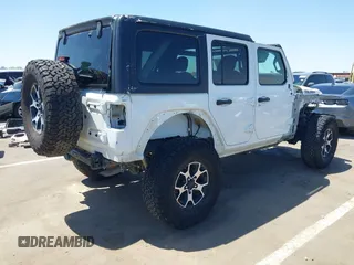 2021 Jeep Wrangler Unlimited Rubicon with VIN 1C4HJXFGXMW850556, listed as a IAAI auction lot 42234282 with 80,834 mi miles and . Bid and sale history available at DreamBid. Image 4.