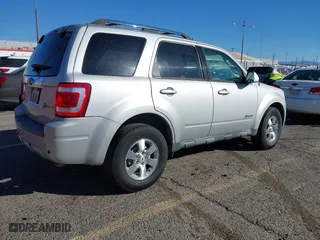 2009 Ford Escape Hybrid with VIN 1FMCU49389KA14781, listed as a IAAI auction lot 41409142 with 155,728 mi miles. Bid and sale history available at carsss.com. Image 4.