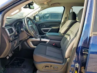 2020 Nissan Titan Platinum Reserve with VIN 1N6AA1EFXLN505021, listed as a Copart auction lot 65716805 with 64,624 mi miles and Salvage title. Bid and sale history available at DreamBid. Image 7.