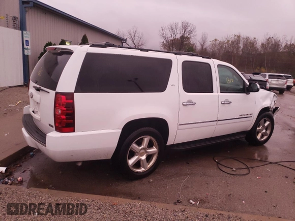 2009 Chevrolet Suburban LTZ with VIN 1GNFC36019J122990, listed as a Copart auction lot 79067174 with 167,632 mi miles and Salvage title. Bid and sale history available at DreamBid. Image 3.