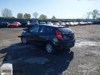 2014 Hyundai Accent GS with VIN KMHCT5AE0EU189319, listed as a IAAI auction lot 41985071 with 72,633 mi miles. Bid and sale history available at carsss.com. Image 3.