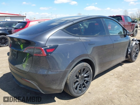 2024 Tesla Model Y Long Range with VIN 7SAYGAEE4RF078906, listed as a IAAI auction lot 42051207 with Not Provided miles and . Bid and sale history available at DreamBid. Image 4.