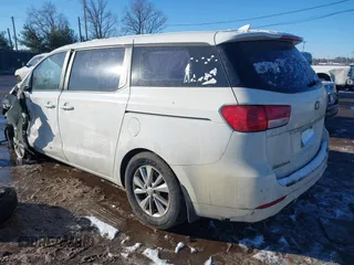 2015 Kia Sedona L with VIN KNDMA5C15F6031279, listed as a IAAI auction lot 41364859 with 149,511 mi miles. Bid and sale history available at carsss.com. Image 3.