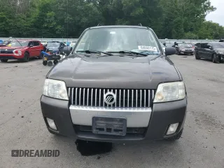 2007 Mercury Mariner Luxury with VIN 4M2YU91137KJ11539, listed as a Copart auction lot 64846175 with 139,488 mi miles and Salvage title. Bid and sale history available at DreamBid. Image 5.