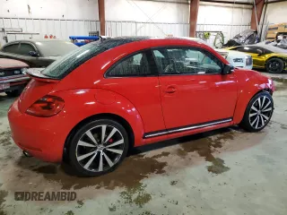 2012 Volkswagen Beetle 2.0T Turbo with VIN 3VW467AT7CM649844, listed as a Copart auction lot 44510205 with 140,411 mi miles and Salvage Title. Bid and sale history available at carsss.com. Image 3.