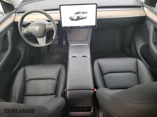 2022 Tesla Model Y Long Range with VIN 7SAYGDEE9NA018421, listed as a Copart auction lot 46869185 with 34,632 mi miles and Salvage Title. Bid and sale history available at carsss.com. Image 8.