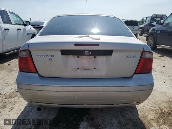 2005 Ford Focus S with VIN 1FAFP34N95W247489, listed as a Copart auction lot 60858415 with Not provided miles and Salvage title. Bid and sale history available at DreamBid. Image 6.