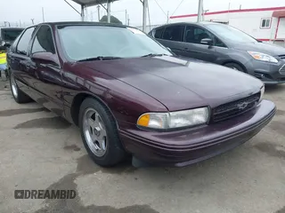 1996 Chevrolet Caprice 1SA Special Value z VIN 1G1BL52P2TR194692, wystawiony jako IAAI lot #42086269 z przebiegiem Nie podano mil oraz . Historia ofert i sprzedaży dostępna na DreamBid. Obrazek 1.