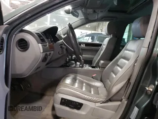 2004 Volkswagen Touareg z VIN WVGCM67L94D032492, wystawiony jako Copart lot #72205044 z przebiegiem 98 482 mil mil oraz Tytuł czysty. Historia ofert i sprzedaży dostępna na DreamBid. Obrazek 7.