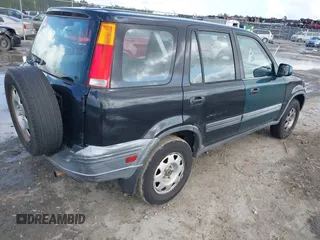 2000 Honda CR-V LX with VIN JHLRD2841YC012945, listed as a IAAI auction lot 41878294 with 306,110 mi miles. Bid and sale history available at carsss.com. Image 4.