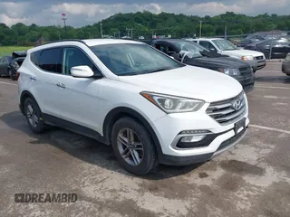 2018 Hyundai Santa Fe 2.4L with VIN 5XYZU3LB3JG570130, listed as a IAAI auction lot 42267383 with 148,926 mi miles and . Bid and sale history available at DreamBid. Image 1.