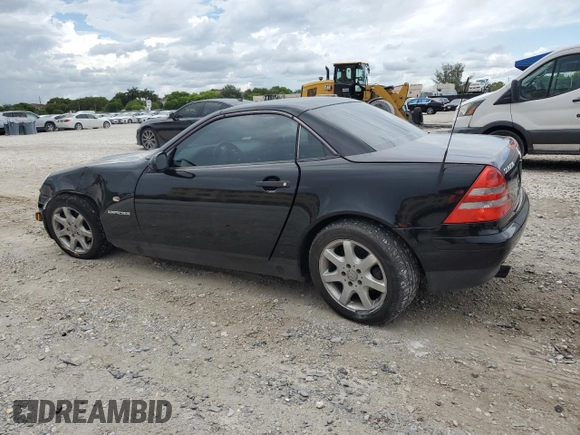 2000 Mercedes-Benz SLK 230 Kompressor with VIN WDBKK47F0YF149827, listed as a Copart auction lot 62524515 with 62,005 mi miles and Salvage title. Bid and sale history available at DreamBid. Image 2.