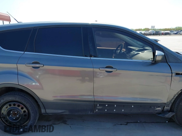 2014 Ford Escape SE with VIN 1FMCU0GX8EUD57801, listed as a IAAI auction lot 41856252 with 136,980 mi miles. Bid and sale history available at carsss.com. Image 14.