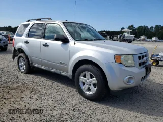 2009 Ford Escape Hybrid z VIN 1FMCU49399KD02275, wystawiony jako Copart lot #55536955 z przebiegiem 50 333 mil mil oraz Szkoda całkowita • Salvage title. Historia ofert i sprzedaży dostępna na DreamBid. Obrazek 4.