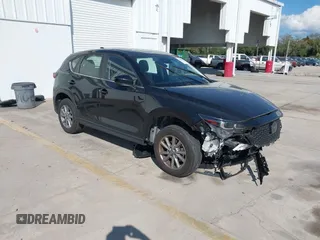 2023 Mazda CX-5 2.5 S with VIN JM3KFBAM3P0104813, listed as a IAAI auction lot 41540923 with 30,861 mi miles. Bid and sale history available at carsss.com. Image 1.