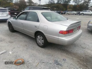 2001 Toyota Camry CE z VIN 4T1BG22K11U803209, wystawiony jako IAAI lot #40770527 z przebiegiem 210 611 mil mil oraz . Historia ofert i sprzedaży dostępna na DreamBid. Obrazek 3.