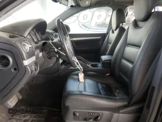 2004 Porsche Cayenne z VIN WP1AA29P94LA21185, wystawiony jako Copart lot #60576755 z przebiegiem 167 428 mil mil oraz Czysty tytuł • Clean title. Historia ofert i sprzedaży dostępna na DreamBid. Obrazek 7.