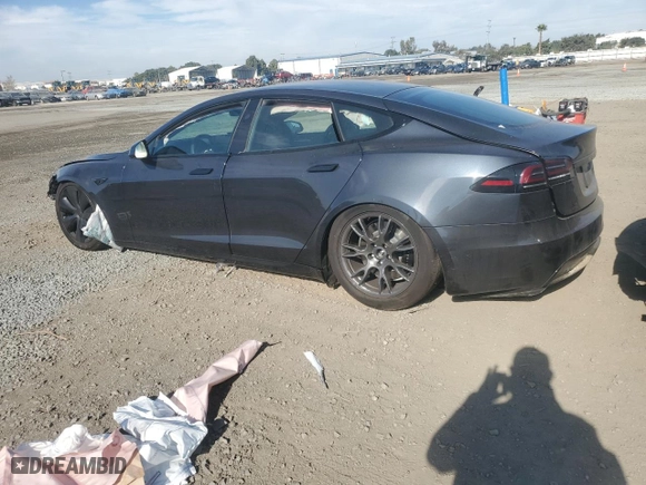 2024 Tesla Model S with VIN 5YJSA1E57RF545269, listed as a Copart auction lot 87419784 with 0 mi miles and Salvage Title. Bid and sale history available at carsss.com. Image 2.