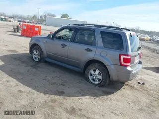 2008 Ford Escape XLT with VIN 1FMCU03178KA47527, listed as a IAAI auction lot 41672719 with 306,312 mi miles. Bid and sale history available at carsss.com. Image 3.