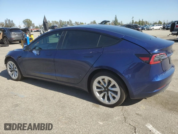 2023 Tesla Model 3 Long Range with VIN 5YJ3E1EB3PF633070, listed as a Copart auction lot 48942545 with 38,332 mi miles and Salvage Title. Bid and sale history available at DreamBid. Image 2.