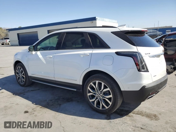 2021 Cadillac XT5 AWD Sport with VIN 1GYKNHRS2MZ156923, listed as a Copart auction lot 52696375 with 19,619 mi miles and Salvage title. Bid and sale history available at DreamBid. Image 2.