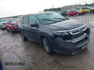 2020 Honda Pilot EX-L with VIN 5FNYF5H5XLB017103, listed as a IAAI auction lot 41557517 with 1 mi miles. Bid and sale history available at carsss.com. Image 1.