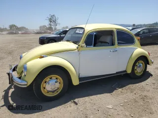 1969 Volkswagen Beetle with VIN 1191032049, listed as a Copart auction lot 55768275 with 6,077 mi miles and Salvage Title. Bid and sale history available at DreamBid. Image 1.