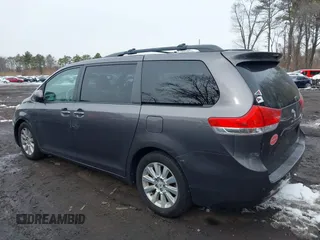 2012 Toyota Sienna XLE with VIN 5TDDK3DC9CS047014, listed as a IAAI auction lot 41551585 with 164,440 mi miles. Bid and sale history available at carsss.com. Image 14.