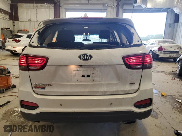 2019 Kia Sorento LX z VIN 5XYPGDA38KG437641, wystawiony jako Copart lot #57094315 z przebiegiem 48 936 mil mil oraz Szkoda całkowita • Salvage title. Historia ofert i sprzedaży dostępna na DreamBid. Obrazek 6.