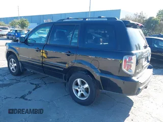 2007 Honda Pilot EX-L with VIN 5FNYF185X7B016807, listed as a IAAI auction lot 41759785 with 129,690 mi miles. Bid and sale history available at carsss.com. Image 3.