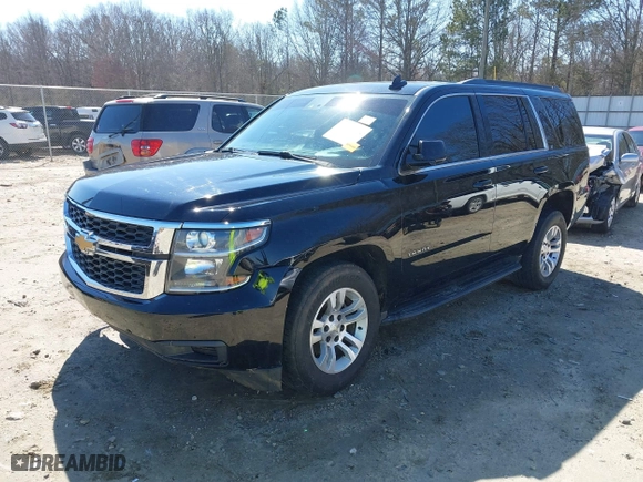 2018 Chevrolet Tahoe LT with VIN 1GNSCBKC7JR254859, listed as a IAAI auction lot 41620074 with 124,714 mi miles. Bid and sale history available at carsss.com. Image 2.