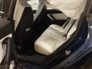 2018 Tesla Model 3 Long Range Battery with VIN 5YJ3E1EB7JF086201, listed as a IAAI auction lot 41965193 with 99,231 mi miles and . Bid and sale history available at DreamBid. Image 8.