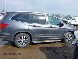 2017 Honda Pilot EX-L with VIN 5FNYF5H53HB029780, listed as a IAAI auction lot 41667838 with 104,803 mi miles. Bid and sale history available at carsss.com. Image 13.