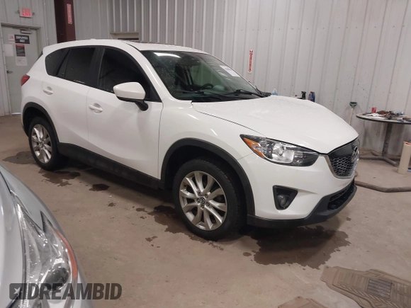 2014 Mazda CX-5 Grand Touring with VIN JM3KE4DY3E0374036, listed as a IAAI auction lot 41889030 with 162,611 mi miles and . Bid and sale history available at DreamBid. Image 1.