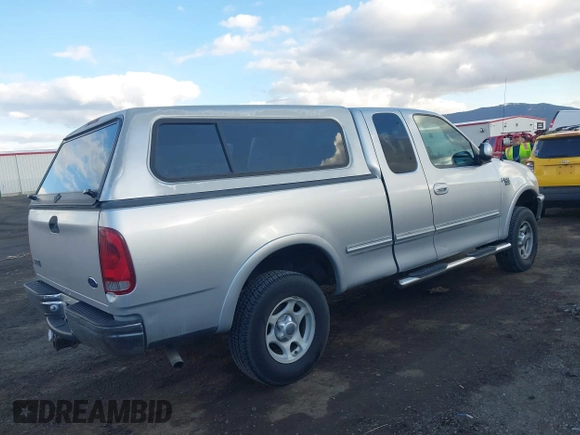 1998 Ford F-150 with VIN 2FTZX18W5WCA42375, listed as a IAAI auction lot 41724649 with 71,034 mi miles and . Bid and sale history available at DreamBid. Image 4.