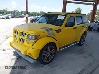 2011 Dodge Nitro z VIN 1D4PU6GX5BW512588, wystawiony jako IAAI lot #42471965 z przebiegiem 115 827 mil mil oraz . Historia ofert i sprzedaży dostępna na DreamBid. Obrazek 2.
