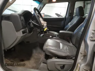2007 Jeep Commander Sport z VIN 1J8HG48P17C547173, wystawiony jako Copart lot #58840465 z przebiegiem 169 135 mil mil oraz Nie do naprawy • Non repairable. Historia ofert i sprzedaży dostępna na DreamBid. Obrazek 7.