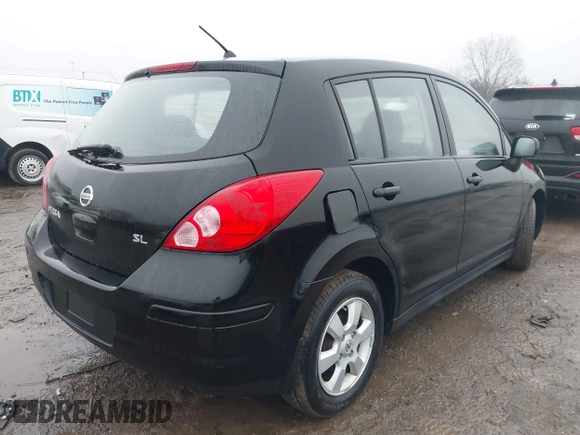2009 Nissan Versa 1.8 SL with VIN 3N1BC13EX9L390055, listed as a IAAI auction lot 41455877 with 126,718 mi miles. Bid and sale history available at carsss.com. Image 4.