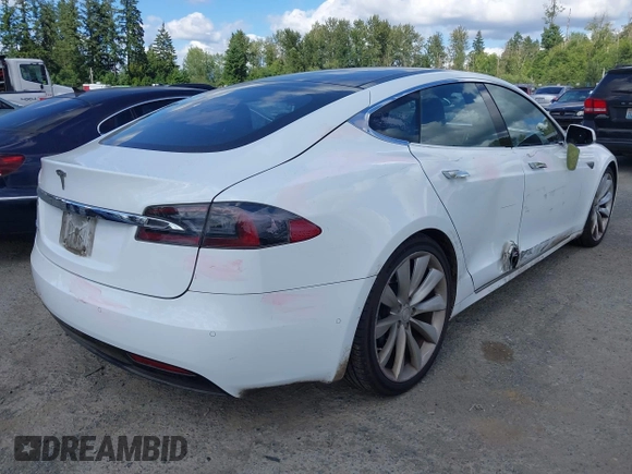 2016 Tesla Model S 90D with VIN 5YJSA1E22GF155747, listed as a IAAI auction lot 42630085 with 97,896 mi miles and . Bid and sale history available at DreamBid. Image 4.