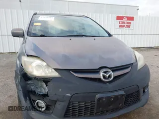 2009 Mazda 5 Sport with VIN JM1CR29L990341261, listed as a IAAI auction lot 41522567 with 123,465 mi miles and . Bid and sale history available at DreamBid. Image 12.